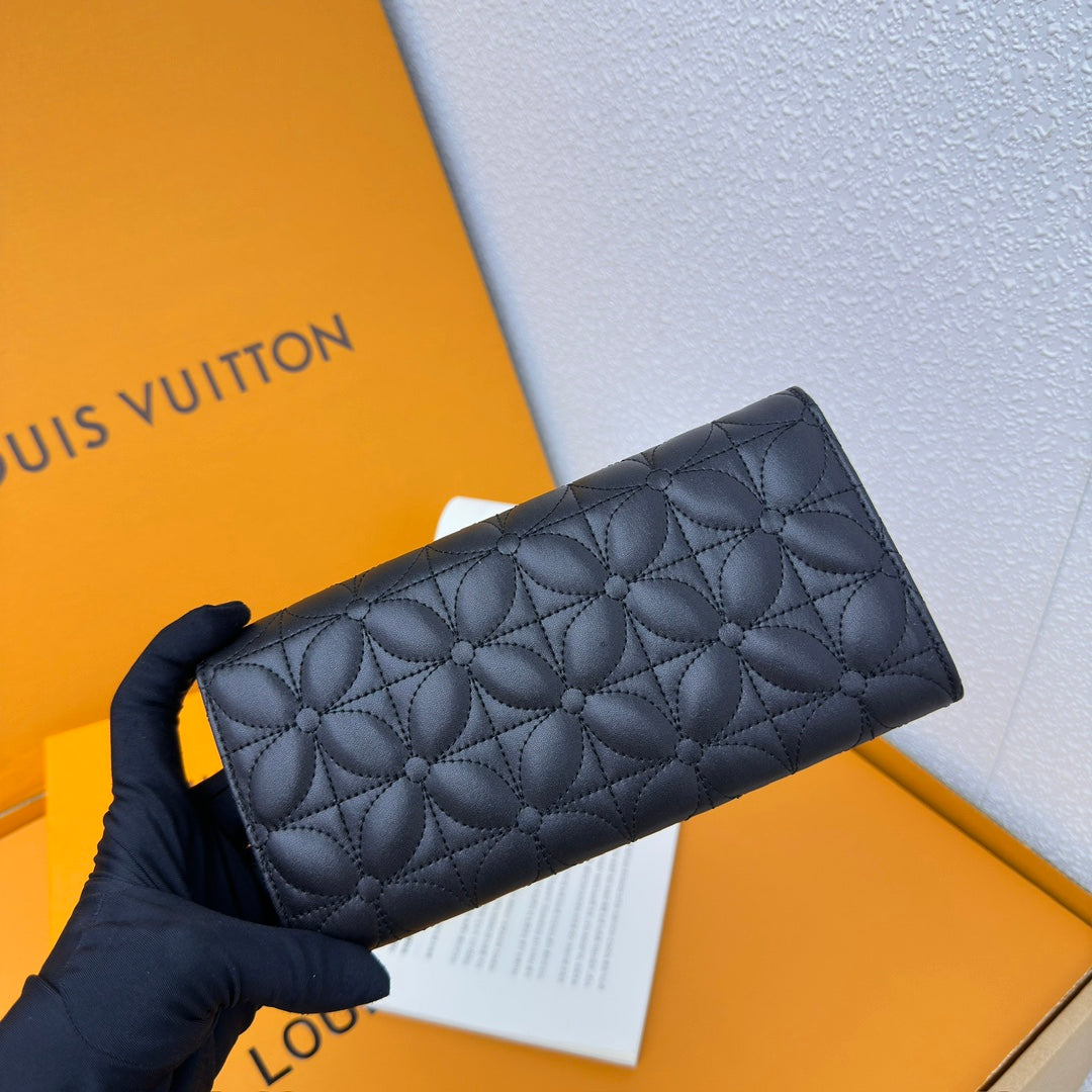 Louis Vuitton Compact Curieuse Wallet en Piel Monogram Empreinte | Elegancia y Funcionalidad
