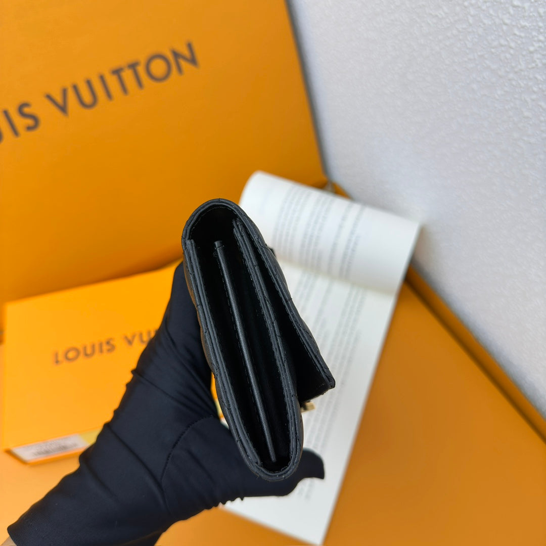 Louis Vuitton Compact Curieuse Wallet en Piel Monogram Empreinte | Elegancia y Funcionalidad