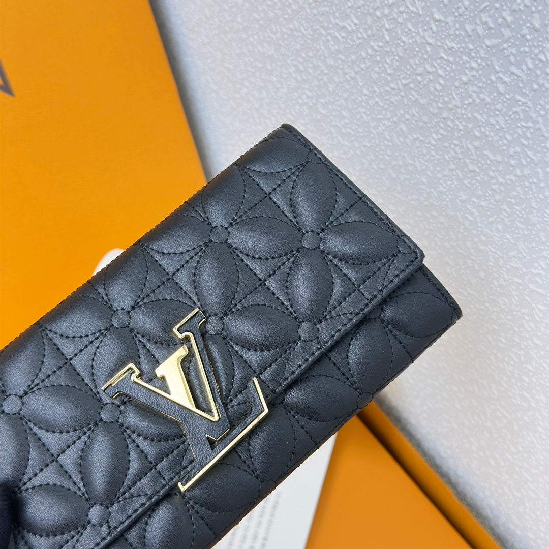 Louis Vuitton Compact Curieuse Wallet en Piel Monogram Empreinte | Elegancia y Funcionalidad