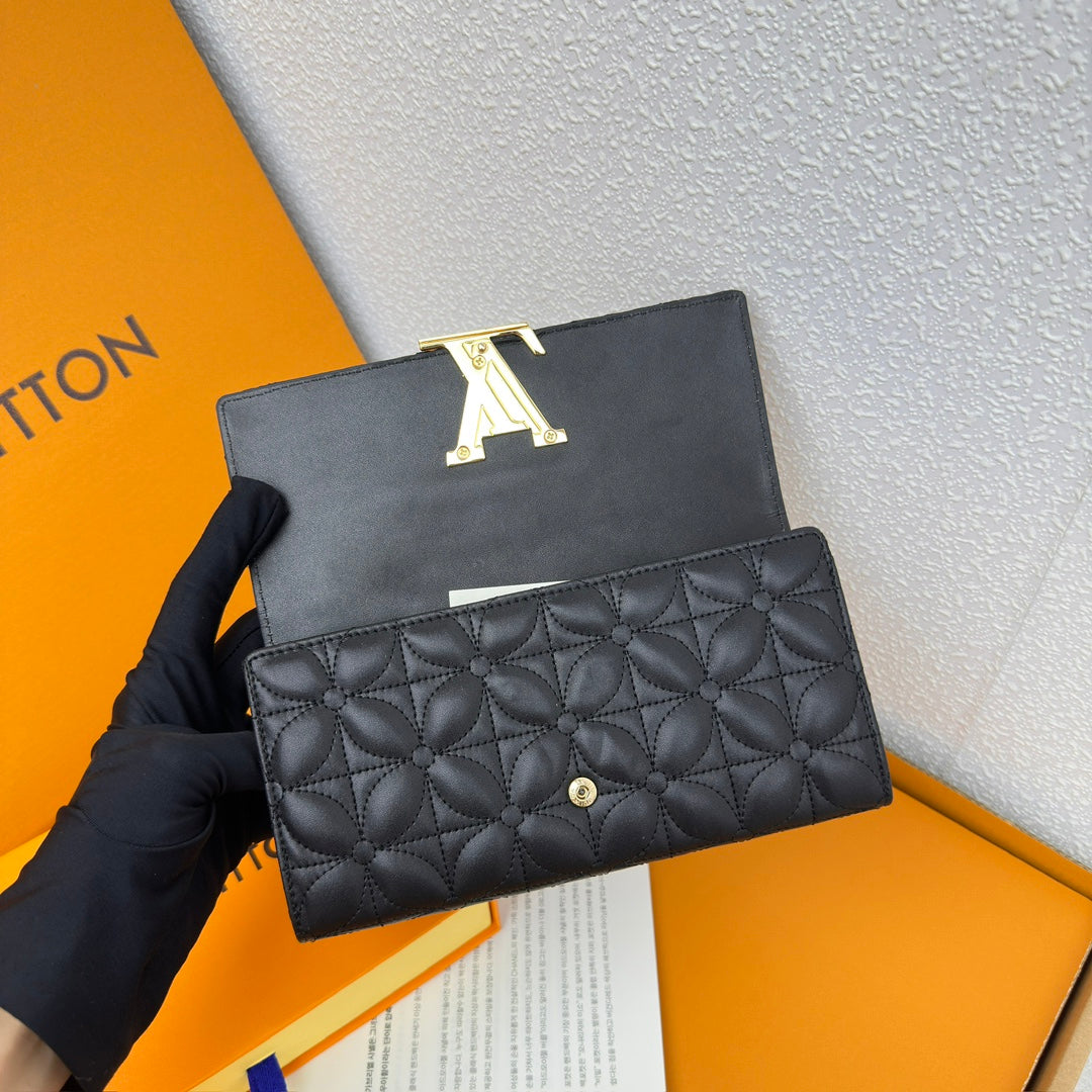 Louis Vuitton Compact Curieuse Wallet en Piel Monogram Empreinte | Elegancia y Funcionalidad