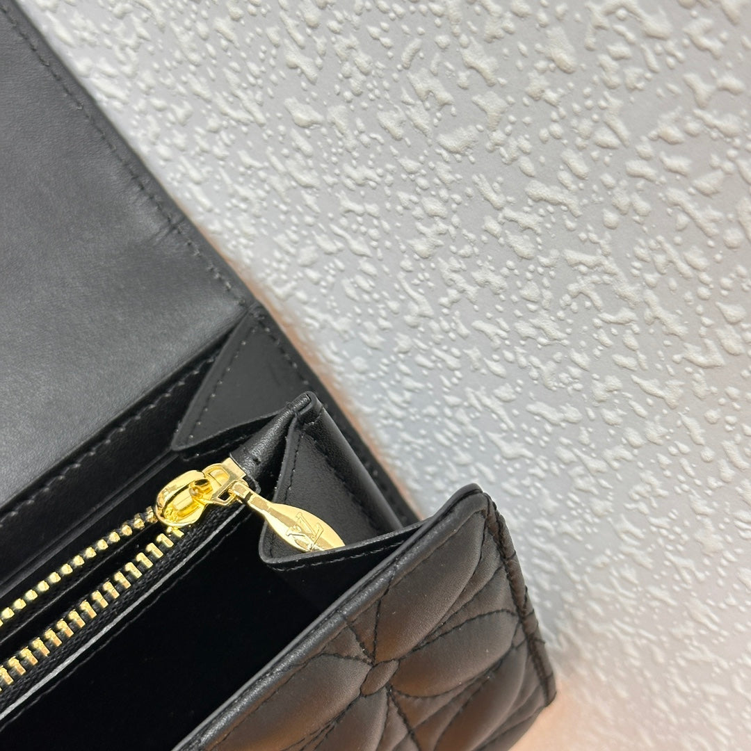 Louis Vuitton Compact Curieuse Wallet en Piel Monogram Empreinte | Elegancia y Funcionalidad