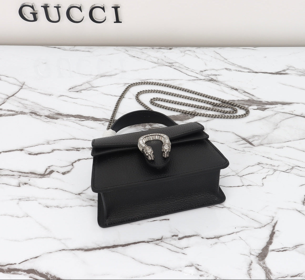 Gucci Dionysus Mini en Cuero Negro y Cristales – Lujo Artesanal y Brillo Sofisticado