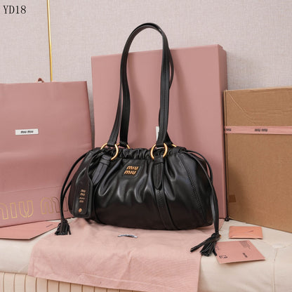 Bolso Miu Miu Joy de Cuero Marrón – Con Correa y Herrajes Dorados