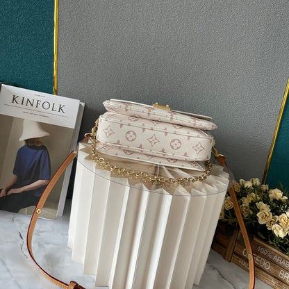 Louis Vuitton East West Métis en Monogram Blanco – Elegancia Compacta con Estilo Moderno