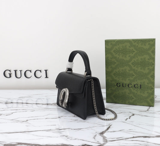 Gucci Dionysus Mini en Cuero Negro y Cristales – Lujo Artesanal y Brillo Sofisticado